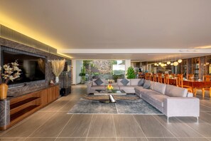 Signature Villa, 6 Bedrooms, Ocean View | Living area | Flat-screen TV, fireplace, heated floors - The Ocean Front Villa Nha Trang Abogo (Nha Trang)