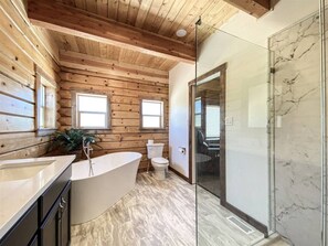 Bathtub, hair dryer, towels