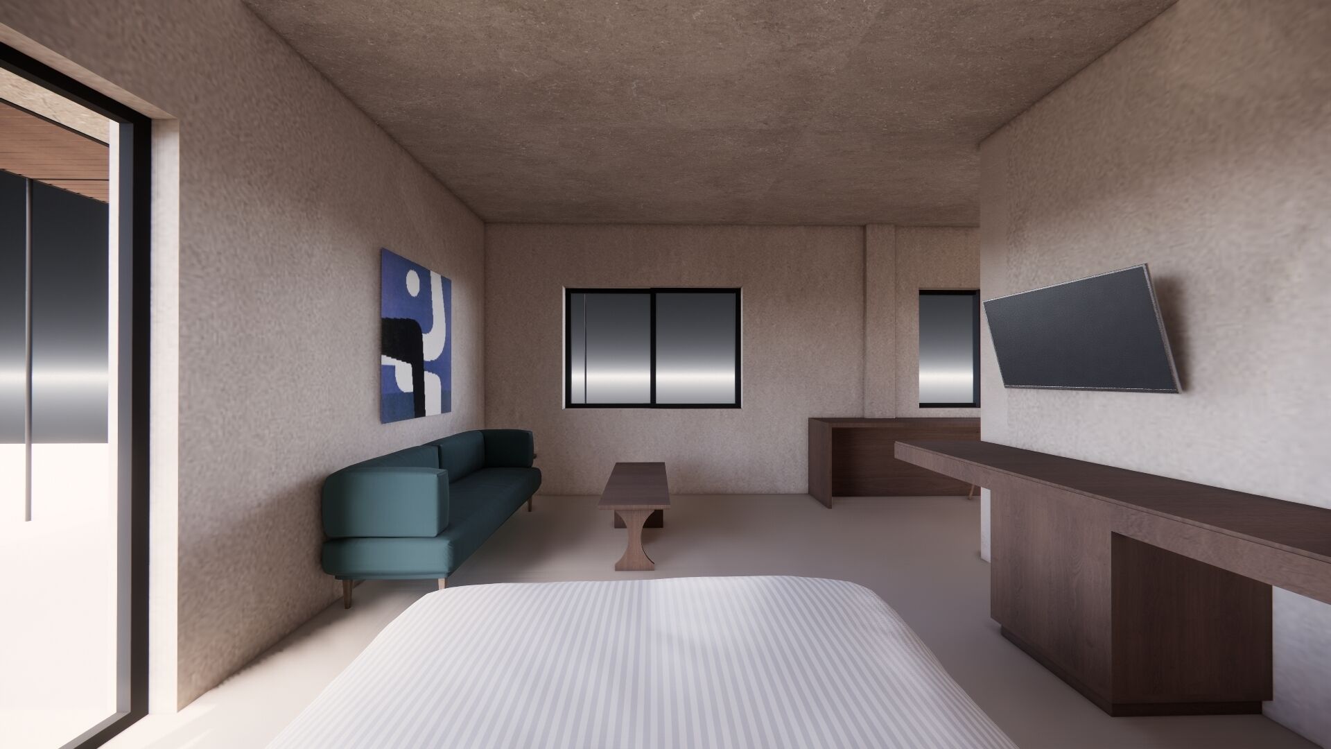 A modern hotel room with a large bed, a sofa, a small table, a TV, and artwork on the walls.