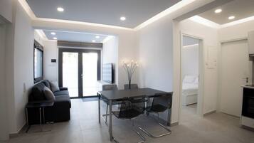 Luxury Apartment | Living area | 43-inch Smart TV with cable channels