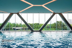 Indoor pool, open 7:00 AM to 10:00 PM, sun loungers, lifeguards on site