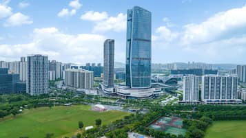 Surrounded by high-rise buildings, this urban oasis offers a tranquil escape amidst the city's contemporary architecture.
