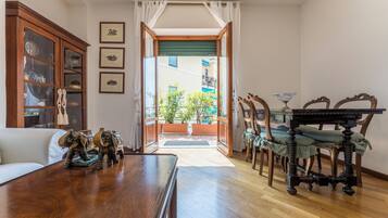 Apartment | Living area | 32-inch flat-screen TV with cable channels