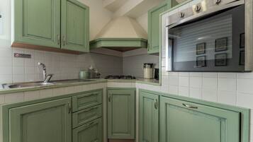 Apartment | Private kitchen | Full-sized fridge, microwave, oven, stovetop