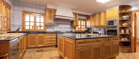 Microwave, oven, dishwasher, dining tables