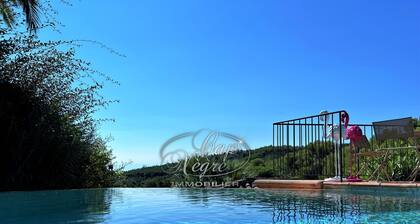 House with a pool and sea view in a quiet area in Cavalière