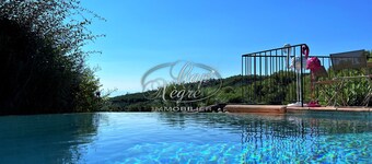 House with a pool and sea view in a quiet area in Cavalière