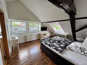2 habitaciones, tabla de planchar con plancha, wifi y ropa de cama