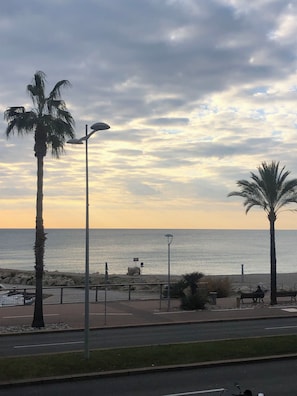 On the beach, sun-loungers, beach towels