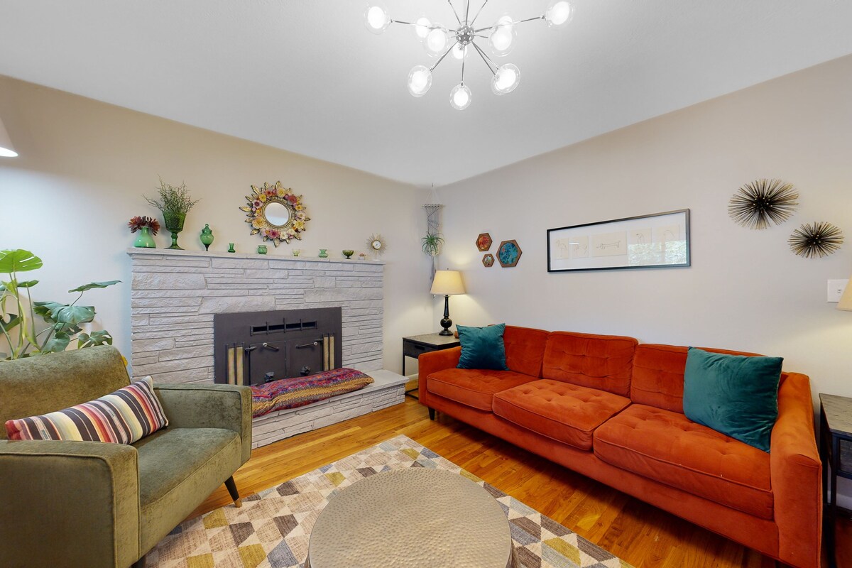 Artsy retreat with a large yard, playground, covered patio