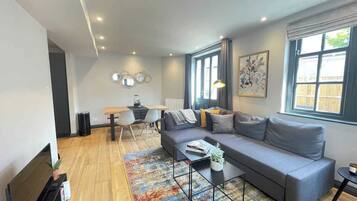 Basic Apartment, 1 Double Bed with Sofa bed | Living area | TV