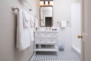 Hair dryer, towels, soap, toilet paper