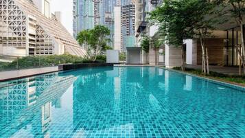 2 outdoor pools, open 7:00 AM to 10:00 PM, pool umbrellas, sun loungers