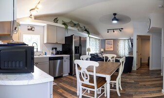 Elite Apartment | Private kitchen | Full-size fridge, microwave, oven, stovetop