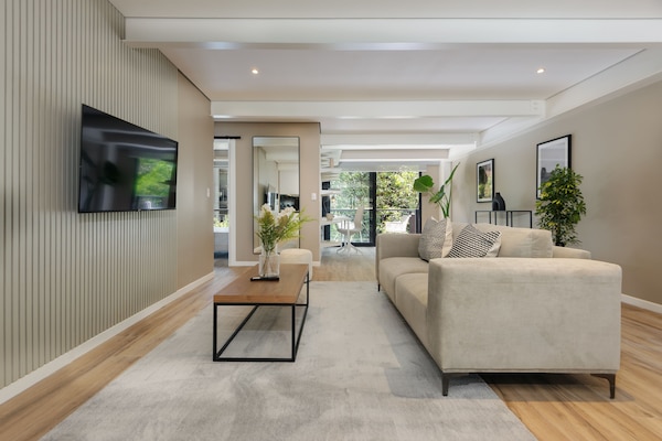 Apartment, 2 Bedrooms, Balcony (1) | Living area | 55-inch Smart TV with digital channels
