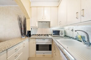 Fridge, microwave, oven, toaster