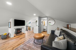 Smart TV, fireplace, books