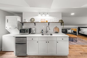 Fridge, microwave, stovetop, coffee/tea maker