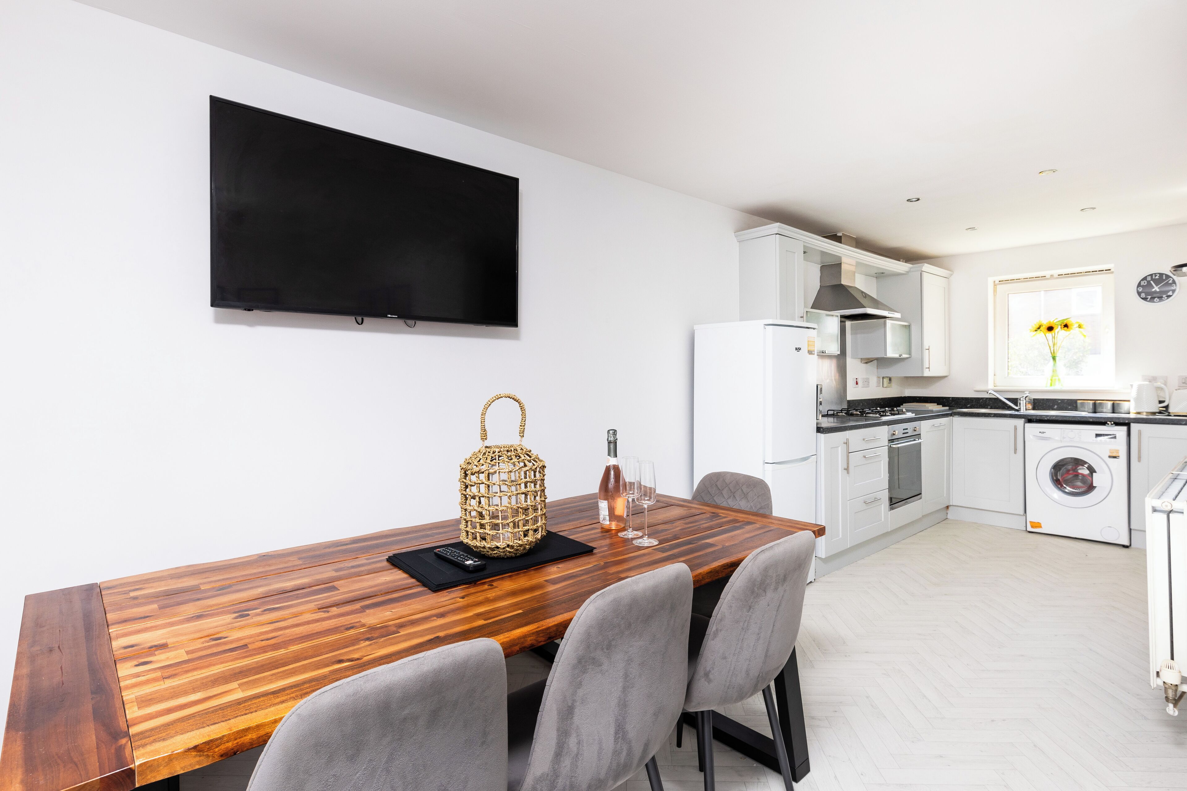 Microwave, oven, dishwasher, dining tables