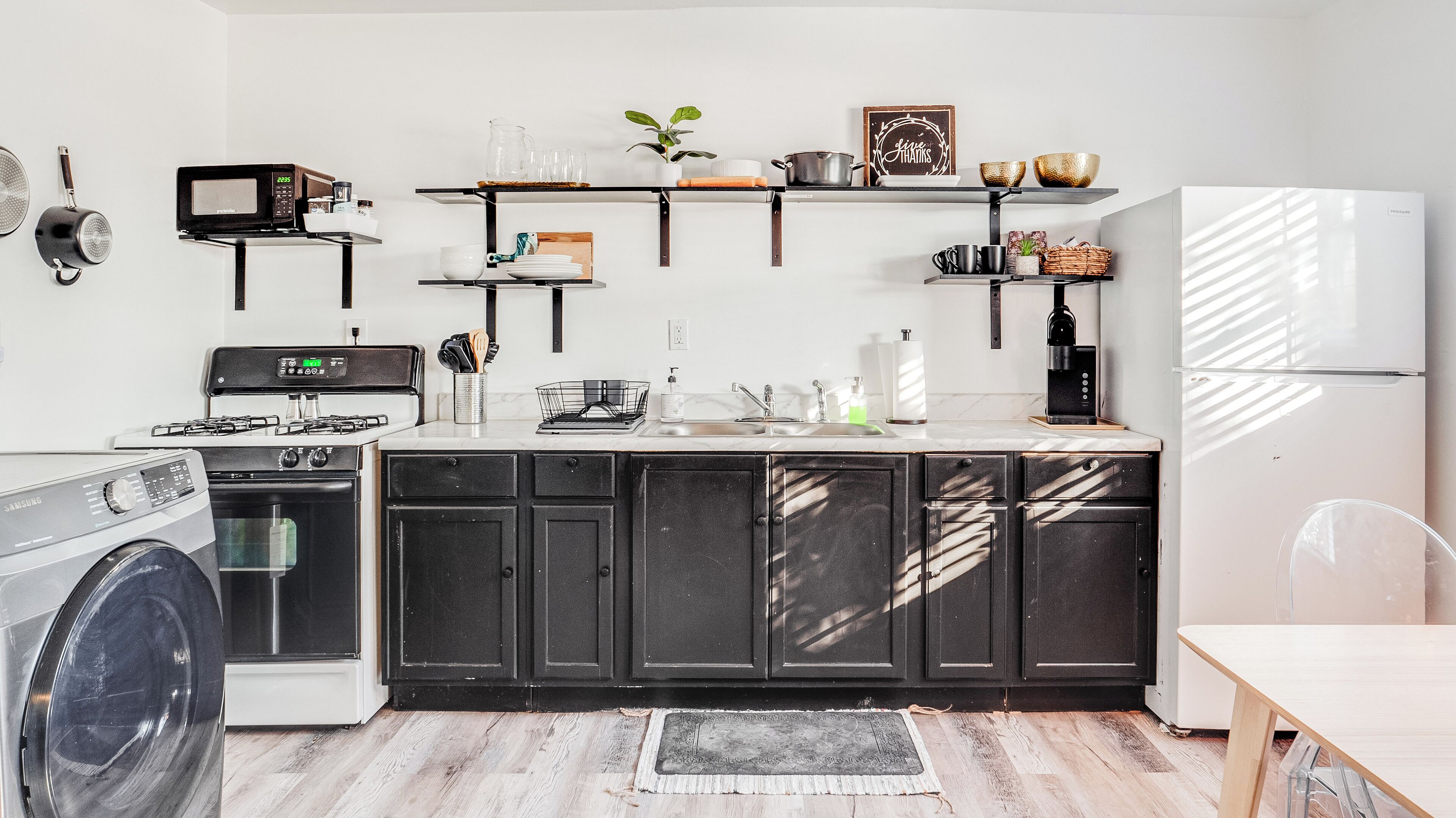 Fridge, coffee/tea maker, cookware/dishes/utensils