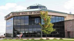 A building with a sign reading "RV/MH Hall of Fame." - The Gemini (Elkhart)