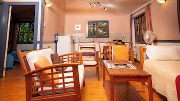 Family Chalet | Living area | 32-inch LCD TV with premium channels