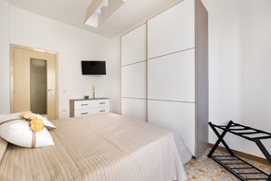 2 slaapkamers, een strijkplank/strijkijzer, wifi, beddengoed