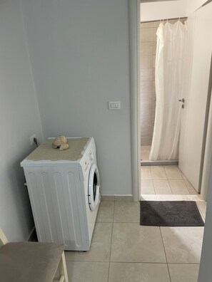 Hair dryer, towels, soap, toilet paper