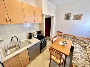 Fridge, stovetop, cookware/dishes/utensils