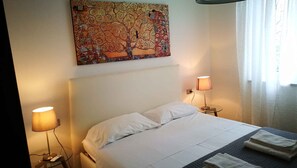 4 dormitorios, tabla de planchar con plancha, cuna de viaje y Internet