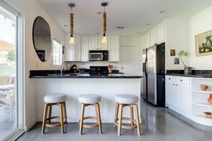 Fridge, microwave, oven, stovetop - The Desert Orchard  · 3 King Beds! Private! Salt Water Pool & Spa! Pets! (Palm Springs)