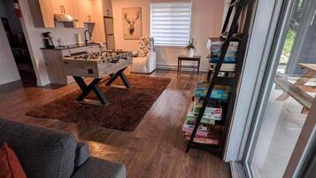 Smart TV, fireplace, foosball
