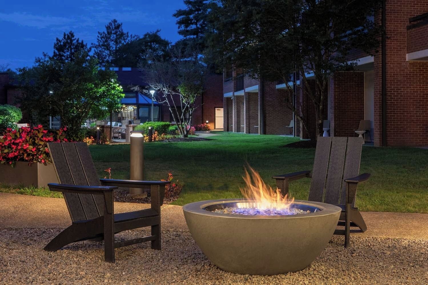 Unwind by the glowing fire pit after a busy day.