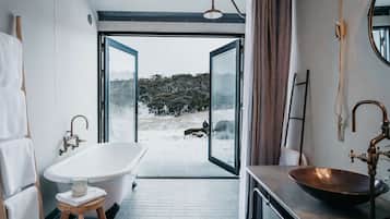 Bathtub, hair dryer, towels