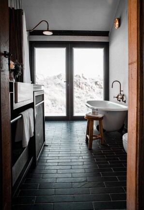 Bathtub, hair dryer, towels
