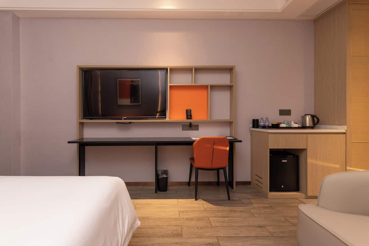 individually decorated, desk, laptop workspace, blackout curtains