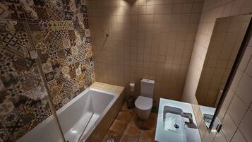 Bathtub, hair dryer, towels