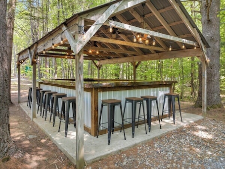 Bar (on property). Two cabins in one space. Enjoy your own private space in the cozy woods. Cabin is divided into two separate rooms. Dog friendly