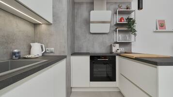 Réfrigérateur, four, plaque de cuisson, lave-vaisselle