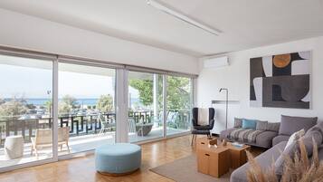 City Apartment | Living area | 50-inch Smart TV with digital channels, Netflix, streaming services