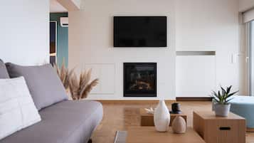 City Apartment | Living area | 50-inch Smart TV with digital channels, Netflix, streaming services