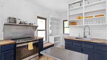 Fridge, stovetop, coffee/tea maker, cookware/dishes/utensils