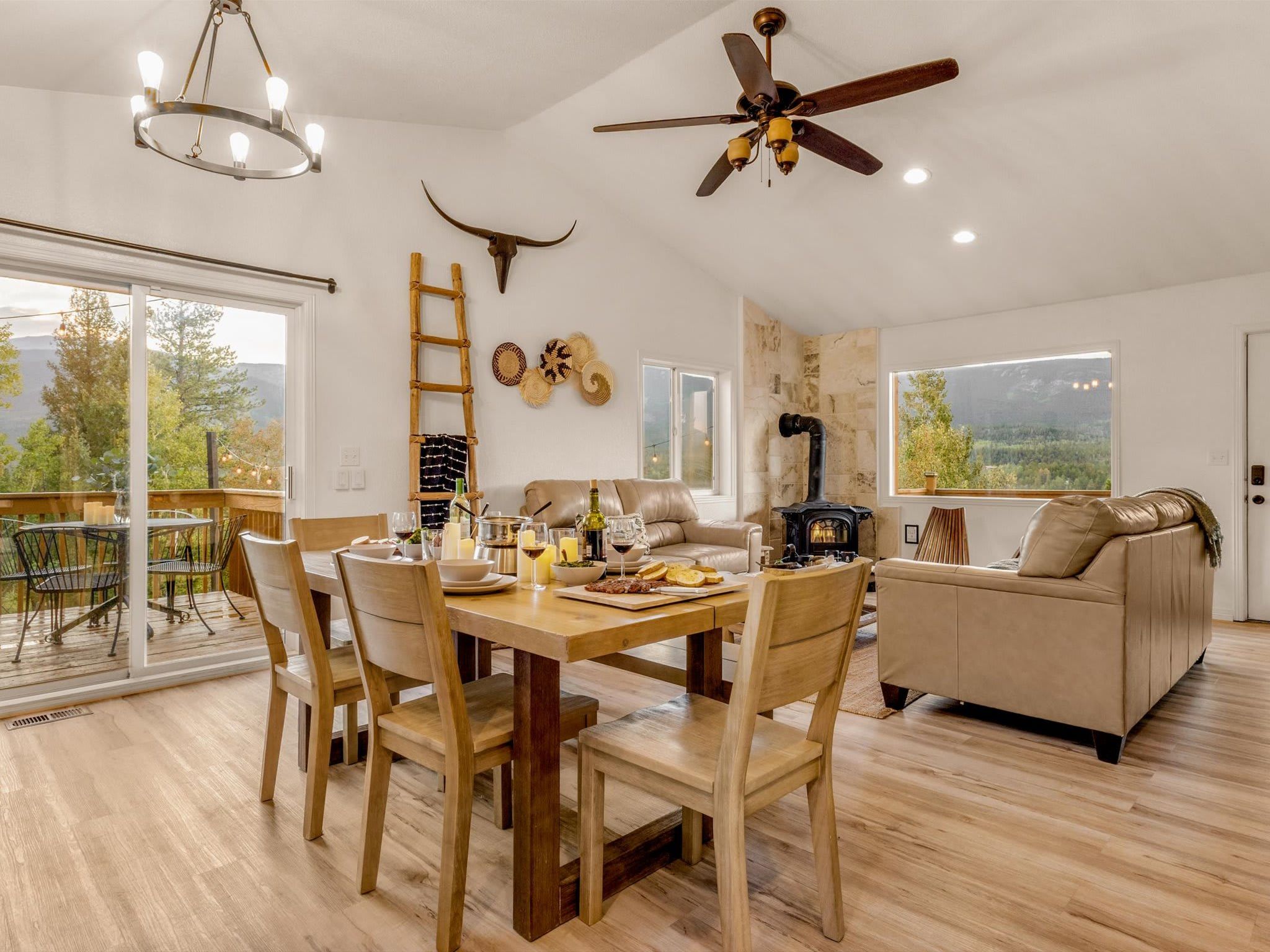 The living room view stops guests mid-sentence. Every seat in this room looks out at something worth staying for.