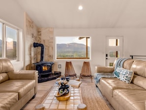 From the iron stove to the mountain range beyond. The view follows you through every room at View Haus. - Theater Dome | Stargazing Hot Tub Hammock Terrace (Bailey)