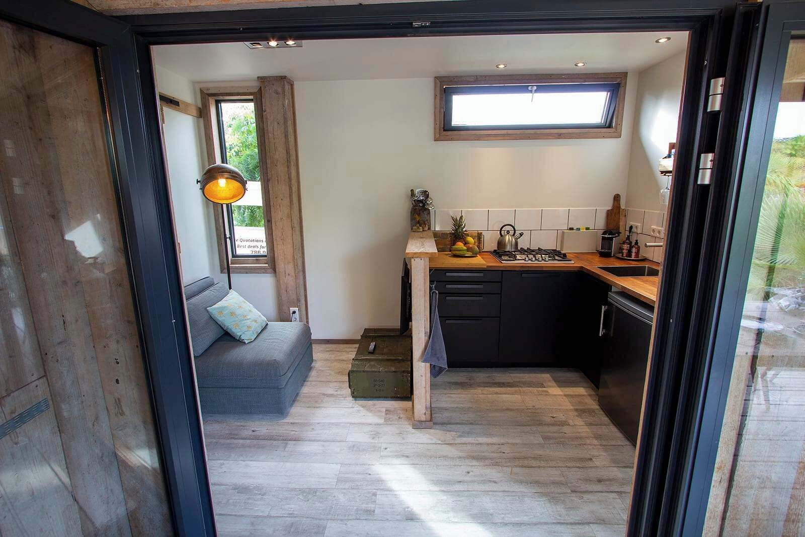 Fridge, stovetop, dishwasher, coffee/tea maker