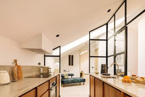 Suite, 1 Bedroom, River View | Private kitchen | Mini-fridge, microwave, oven, espresso maker