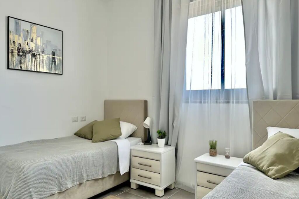 3 dormitorios, tabla de planchar con plancha, wifi y ropa de cama