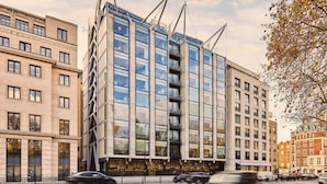 A modern building with large windows and a unique architectural design. - The Emory, Maybourne (London)