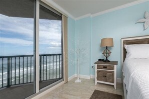 Enjoy ocean views from the balcony through the large sliding glass door.