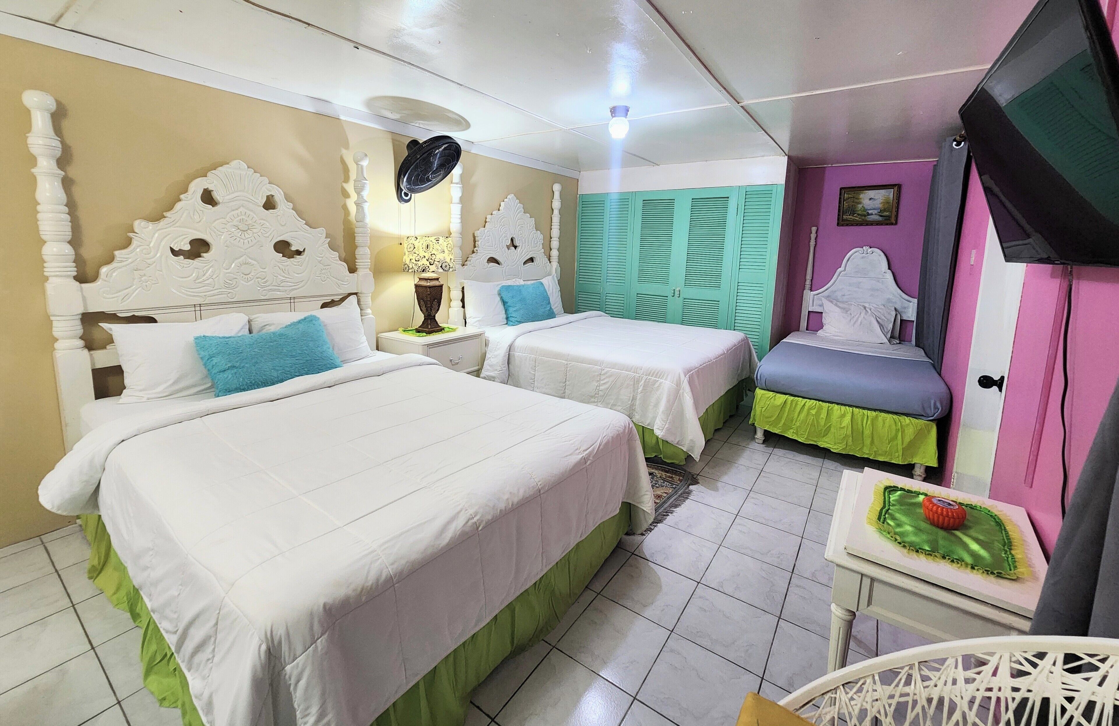 Family Room, Multiple Beds, Pool Access | Iron/ironing board, free WiFi, bed sheets